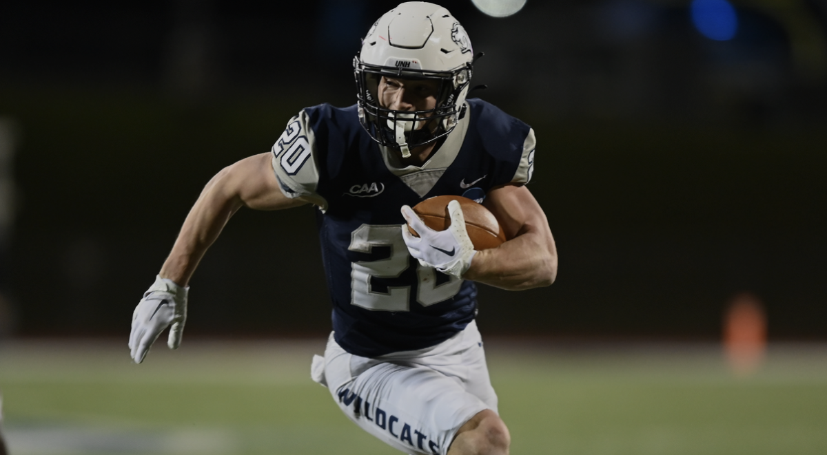 Dylan Laube rushes towards the endzone